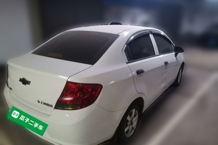 Used Chevrolet Sail 2013 Sedan 1.2L Manual Fashionable Happiness Edition Rear Right 45 Deg