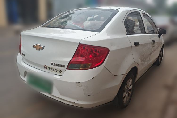 Used Chevrolet Sail 2013 Sedan 1.2L Manual Fashionable Happiness Edition Rear Right 45 Deg