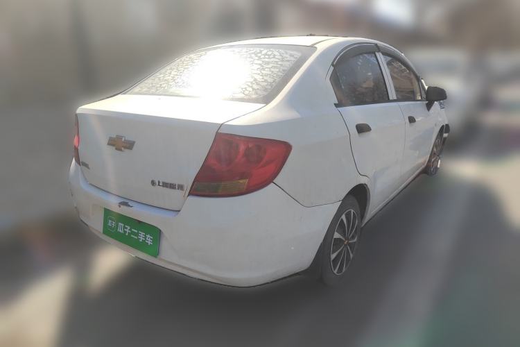 Used Chevrolet Sail 2013 Sedan 1.2L AMT Ideal Edition Rear Right 45 Deg