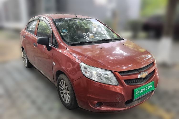 Used Chevrolet Sail 2013 Sedan 1.2L Manual Fashionable Happiness Edition Front Right 45 Deg
