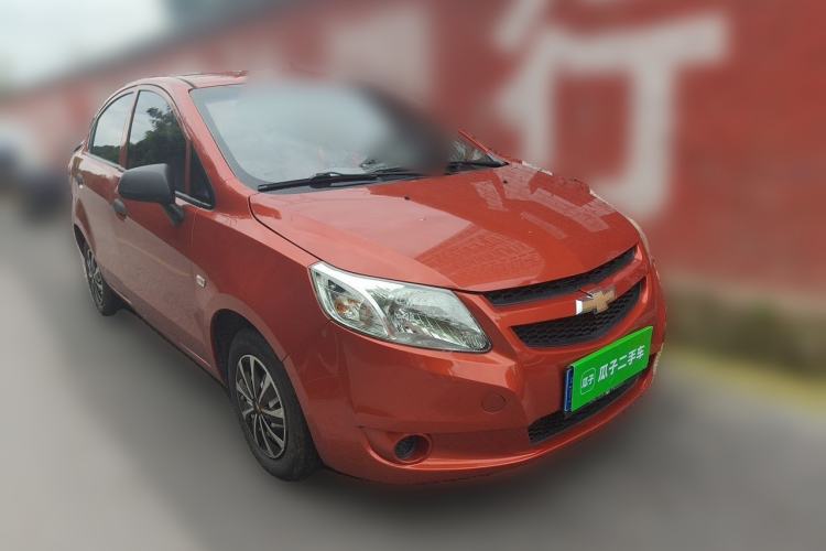 Used Chevrolet Sail 2013 Sedan 1.2L Manual Fashionable Happiness Edition Front Right 45 Deg