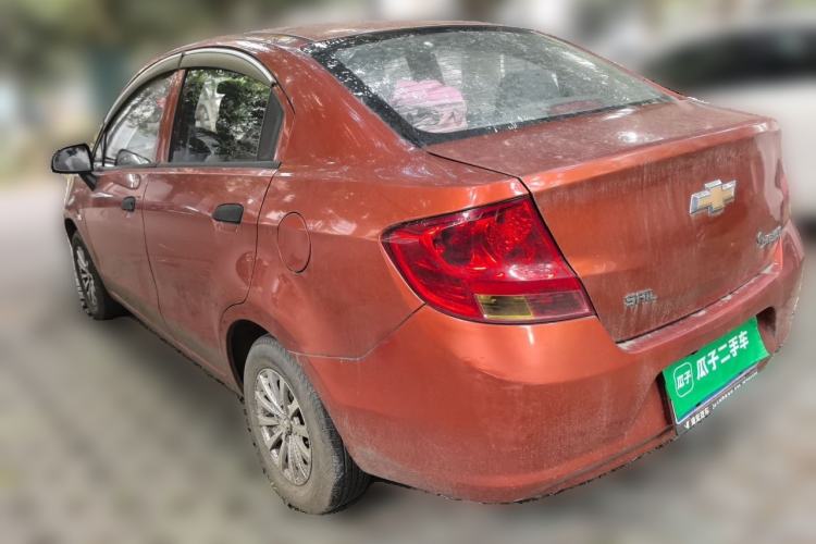 Used Chevrolet Sail 2013 Sedan 1.2L Manual Fashionable Happiness Edition Rear Left 45 Deg