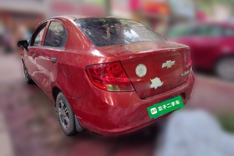 Used Chevrolet Sail 2013 Sedan 1.2L Manual Warm Edition Rear Left 45 Deg