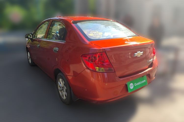Used Chevrolet Sail 2013 Sedan 1.2L Manual Fashionable Happiness Edition Rear Left 45 Deg