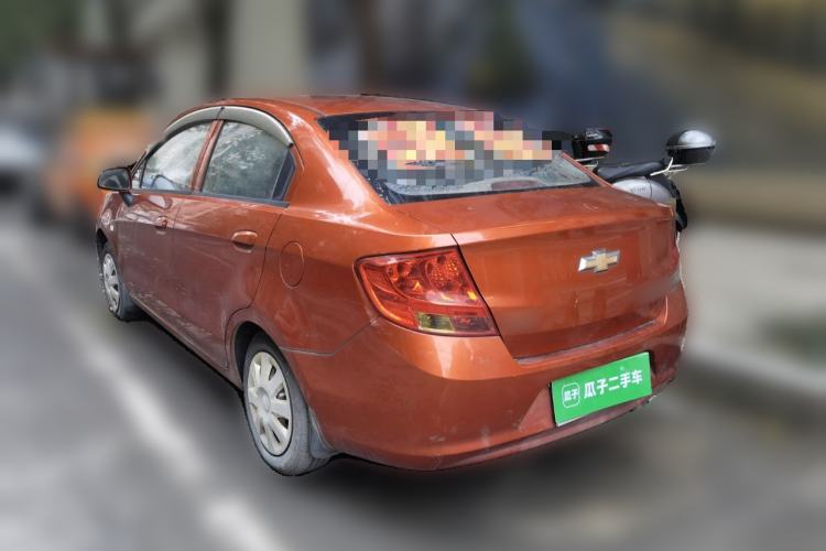Used Chevrolet Sail 2013 Sedan 1.4L Manual Elegance Edition Rear Left 45 Deg
