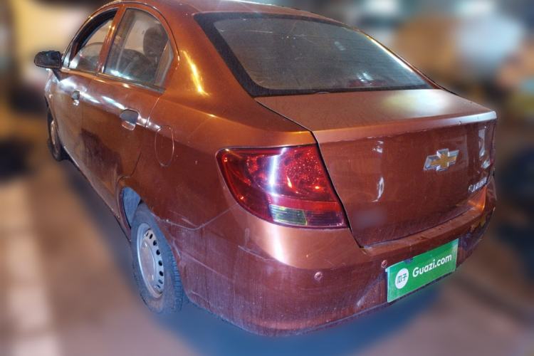 Used Chevrolet Sail 2013 Sedan 1.2L Manual Fashionable Happiness Edition Rear Left 45 Deg