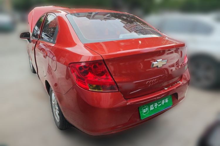 Used Chevrolet Sail 2013 Sedan 1.4L Manual Happiness Edition II Rear Left 45 Deg