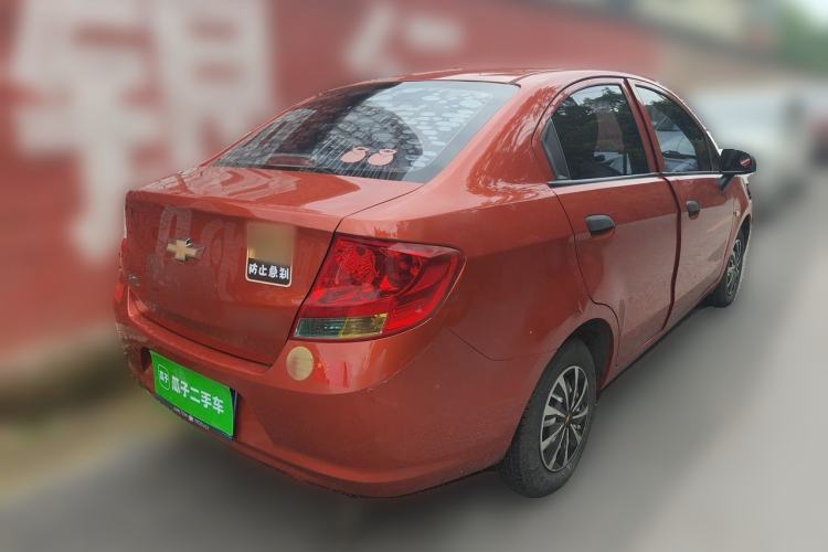 Used Chevrolet Sail 2013 Sedan 1.2L Manual Fashionable Happiness Edition Rear Right 45 Deg