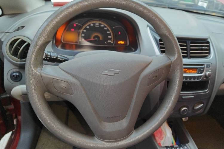 Used Chevrolet Sail 2013 Sedan 1.4L Manual Happiness Edition II Steering Wheel