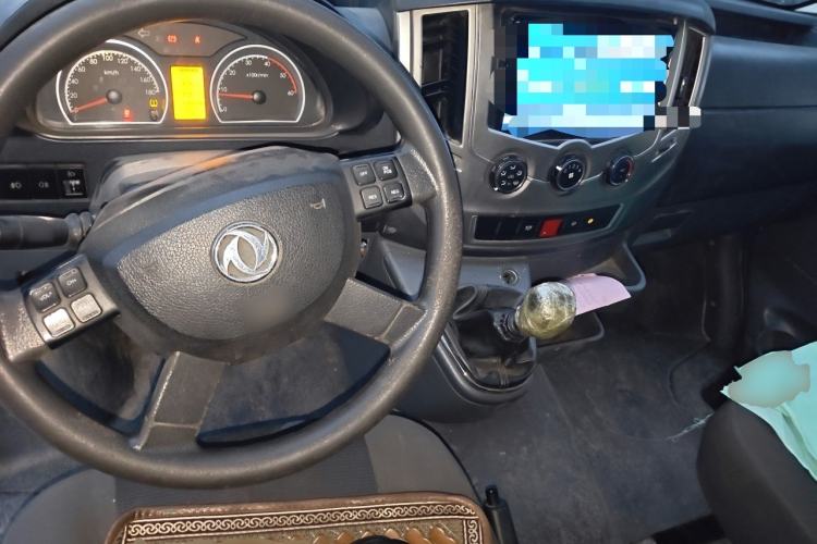 Used Dongfeng Yufeng 2020 2.3T Economy Logistics Vehicle Long Wheelbase Mid-Roof Design 5-9 Seater WP2.3 Center Console