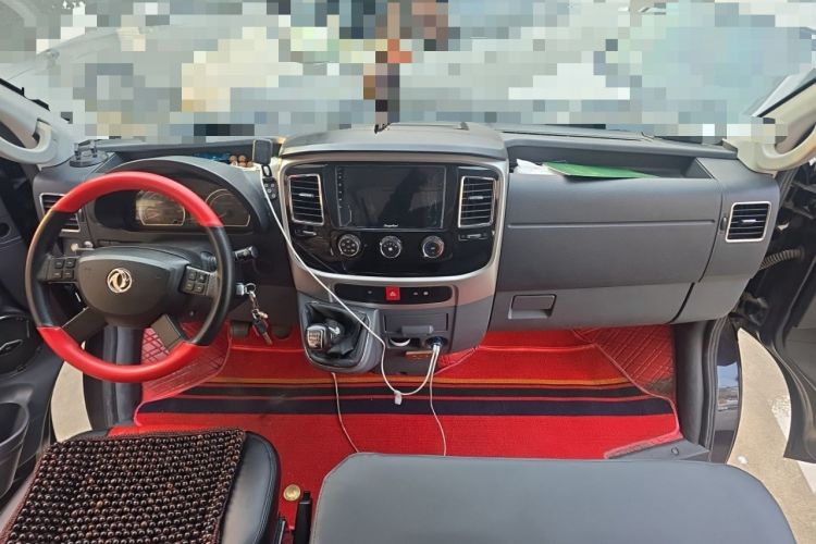 Used Dongfeng Yufeng 2021 2.0T Power King Front-Drive Logistics Vehicle Long Wheelbase Mid-Roof Design 6–9 Seats China VI Emission Standard ZD20 Center Console