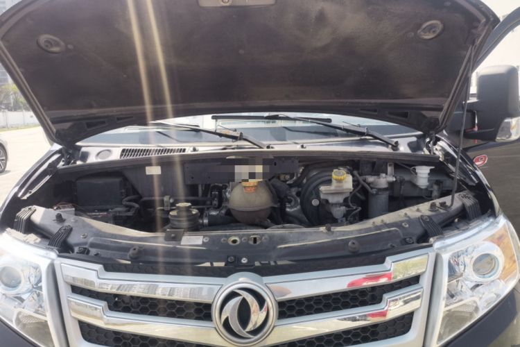 Used Dongfeng Yufeng 2021 2.0T Power King Front-Drive Logistics Vehicle Long Wheelbase Mid-Roof Design 6–9 Seats China VI Emission Standard ZD20 Engine Bay