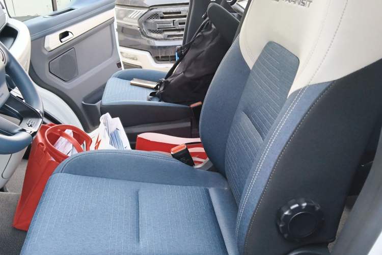Used Ford E-Transit 2024 Elite Coach Model Mid-axle Mid-roof Design 9 Seats 100.96 kWh Left Front Seat