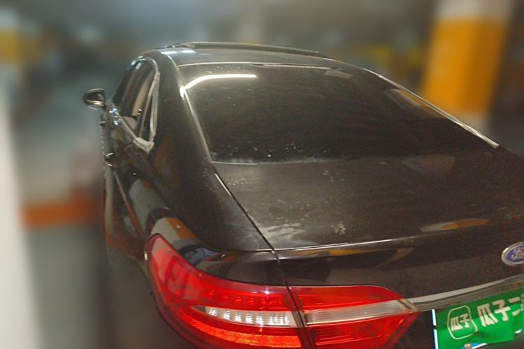 Used Ford Taurus 2015 EcoBoost 245 Luxury Model Rear Left 45 Deg