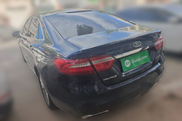 Used Ford Taurus 2015 EcoBoost 245 Luxury Model Rear Left 45 Deg