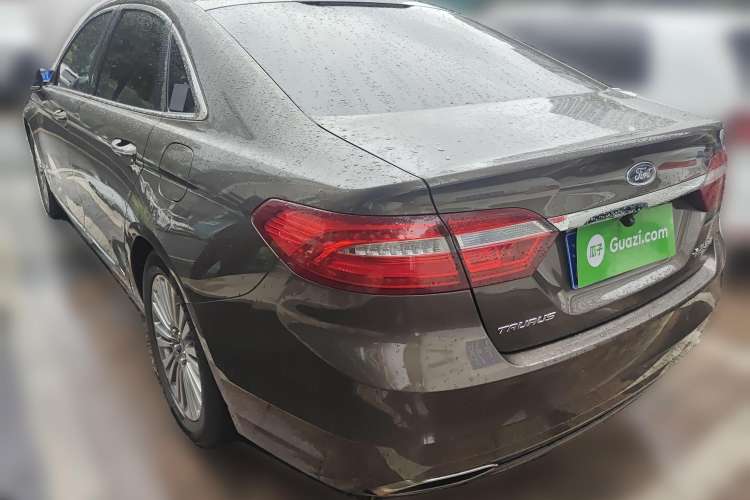 Used Ford Taurus 2015 EcoBoost 245 Luxury Model Rear Left 45 Deg