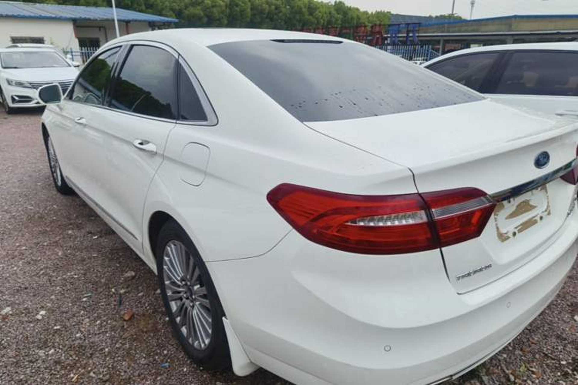 Used Ford Taurus 2015 EcoBoost 245 Luxury Model Rear Left 45 Deg