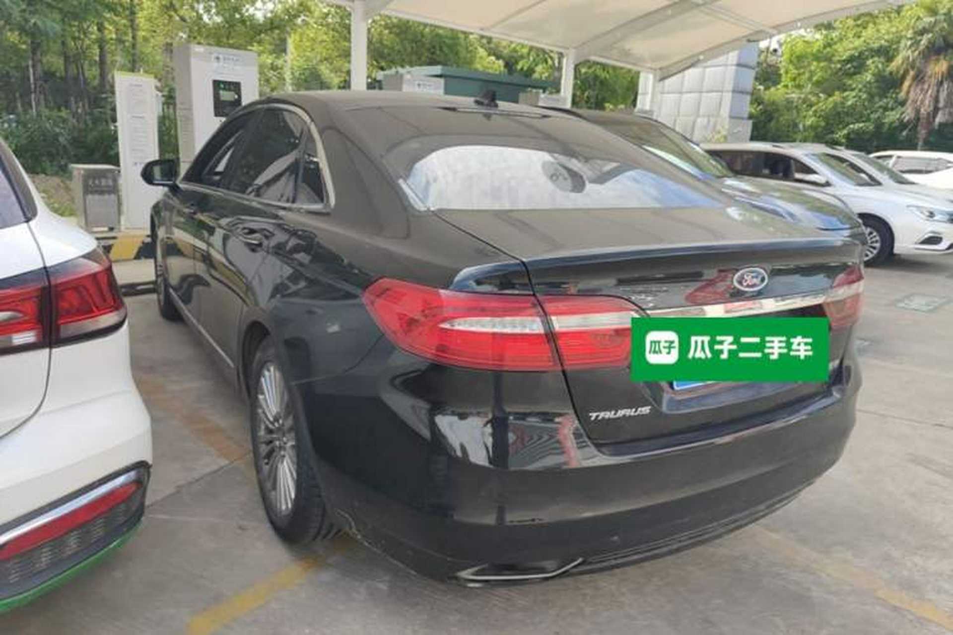 Used Ford Taurus 2017 EcoBoost 245 Luxury Model Rear Left 45 Deg
