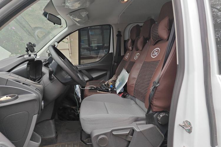 Used Ford Transit 2020 2.0T Gasoline Multi-Function Commercial Vehicle Mid-Drive Low-Roof Design with Dual Rear Doors Meeting China VI Emission Standards Left Front Seat