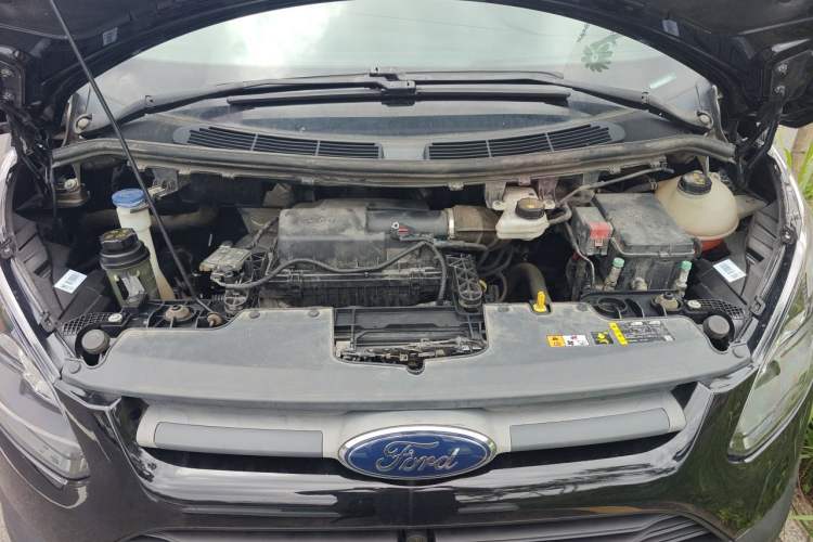 Used Ford Transit 2020 2.0T Diesel Multi-Function Commercial Vehicle Mid-Chassis Low-Roof Design with Dual Rear Doors Emission Standard China V Engine Bay