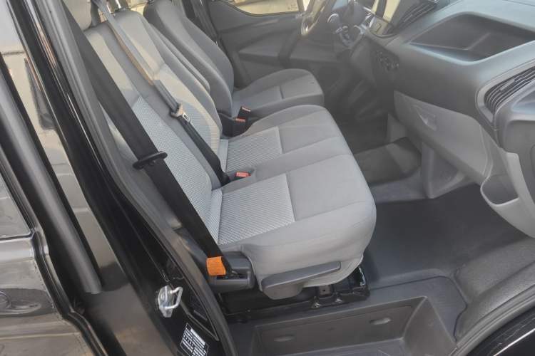 Used Ford Transit 2020 2.0T Diesel Multi-Function Commercial Vehicle Mid-Chassis Low-Roof Design with Dual Rear Doors Meeting China VI Emission Standards Left Front Seat