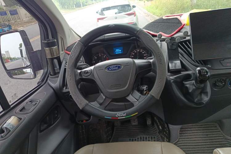 Used Ford Transit 2020 2.0T Diesel Multi-Function Commercial Vehicle Mid-Chassis Low-Roof Design with Dual Rear Doors Meeting China VI Emission Standards Steering Wheel
