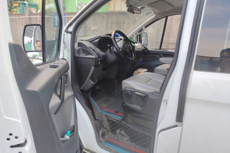 Used Ford Transit 2020 2.0T Gasoline Automatic Multi-Function Commercial Vehicle Mid-axle Low-roof Design with Dual Rear Doors Meeting China VI Emission Standards Driver Seat