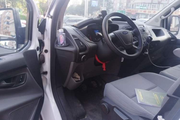 Used Ford Transit 2020 2.0T Diesel Multi-Function Commercial Vehicle Mid-Chassis Low-Roof Design with Dual Rear Doors Meeting China VI Emission Standards Driver Seat