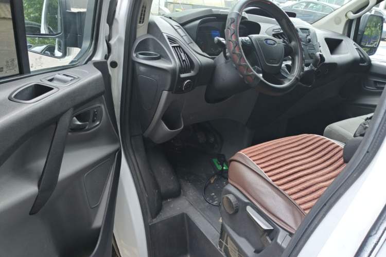 Used Ford Transit 2020 2.0T Gasoline Multi-Function Commercial Vehicle Mid-Drive Low-Roof Design with Dual Rear Doors Meeting China VI Emission Standards Driver Seat