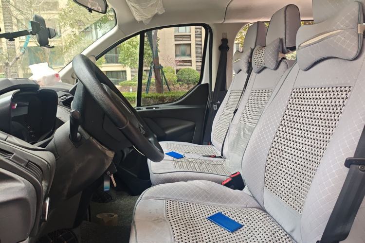 Used Ford Transit 2020 2.0T Diesel Multi-Function Commercial Vehicle Mid-Chassis Low-Roof Design with Dual Rear Doors Meeting China VI Emission Standards Left Front Seat