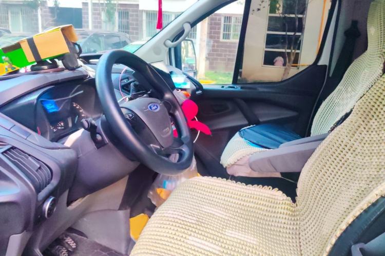 Used Ford Transit 2020 2.0T Diesel Multi-Function Commercial Vehicle Mid-Chassis Low-Roof Design with Dual Rear Doors Meeting China VI Emission Standards Left Front Seat