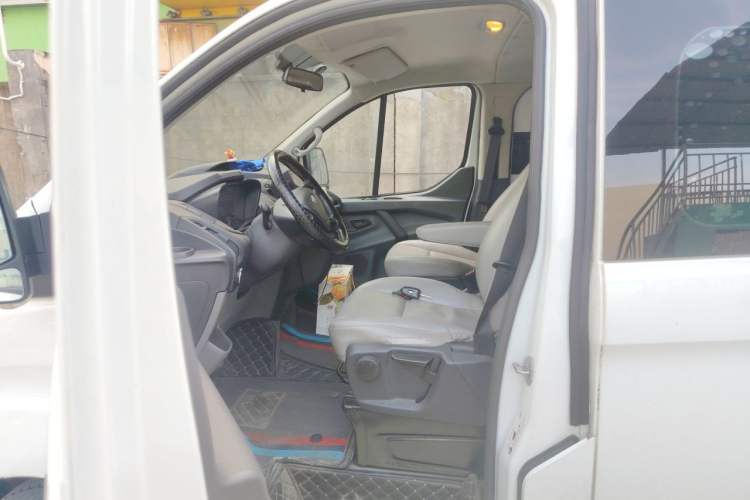 Used Ford Transit 2020 2.0T Gasoline Automatic Multi-Function Commercial Vehicle Mid-axle Low-roof Design with Dual Rear Doors Meeting China VI Emission Standards Left Front Seat