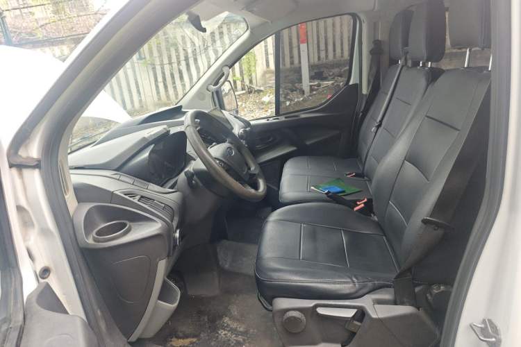 Used Ford Transit 2020 2.0T Diesel Multi-Function Commercial Vehicle Mid-Chassis Low-Roof Design with Dual Rear Doors Meeting China VI Emission Standards Left Front Seat