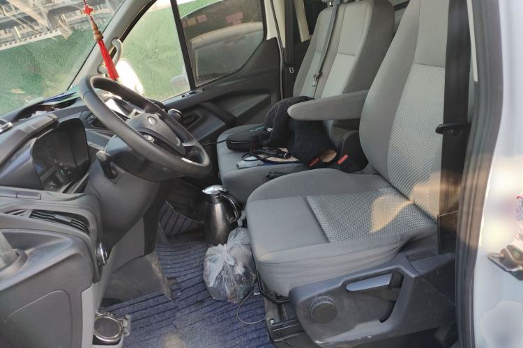 Used Ford Transit 2020 2.0T Gasoline Multi-Function Commercial Vehicle Mid-Drive Low-Roof Design with Dual Rear Doors Meeting China VI Emission Standards Left Front Seat