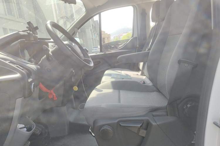 Used Ford Transit 2020 2.0T Diesel Multi-Function Commercial Vehicle Mid-Chassis Low-Roof Design with Dual Rear Doors Emission Standard China V Left Front Seat