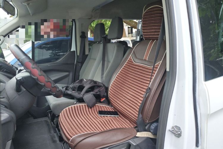 Used Ford Transit 2020 2.0T Gasoline Multi-Function Commercial Vehicle Mid-Drive Low-Roof Design with Dual Rear Doors Meeting China VI Emission Standards Left Front Seat