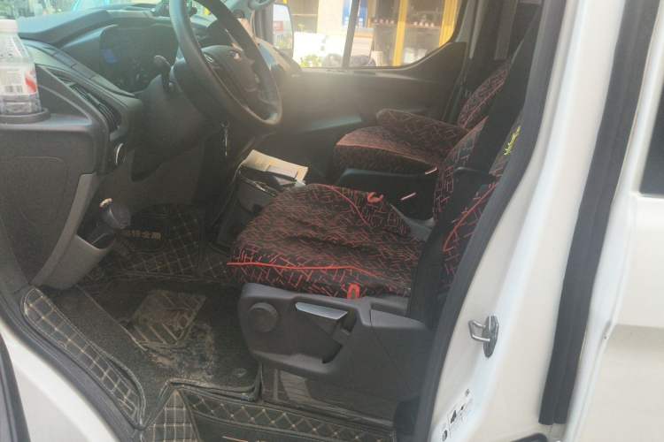 Used Ford Transit 2020 2.0T Diesel Multi-Function Commercial Vehicle Mid-Chassis Low-Roof Design with Dual Rear Doors Meeting China VI Emission Standards Left Front Seat
