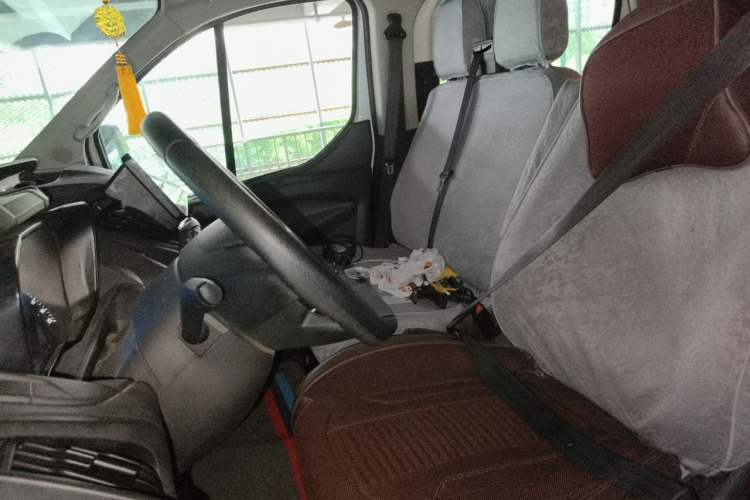 Used Ford Transit 2020 2.0T Diesel Multi-Function Commercial Vehicle Mid-Chassis Low-Roof Design with Dual Rear Doors Meeting China VI Emission Standards Left Front Seat