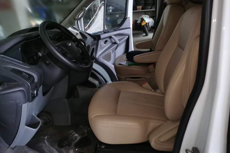 Used Ford Transit 2020 2.0T Gasoline Automatic Multi-Function Commercial Vehicle Mid-axle Low-roof Design with Dual Rear Doors Meeting China VI Emission Standards Left Front Seat
