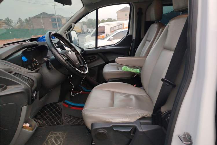 Used Ford Transit 2020 2.0T Gasoline Automatic Multi-Function Commercial Vehicle Mid-axle Low-roof Design with Dual Rear Doors Meeting China VI Emission Standards Left Front Seat