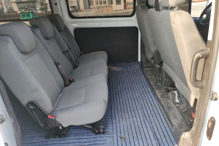 Used Ford Transit 2020 2.0T Gasoline Multi-Function Commercial Vehicle Mid-Drive Low-Roof Design with Dual Rear Doors Meeting China VI Emission Standards Left Rear Seat