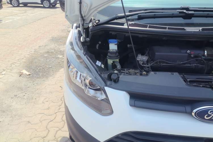 Used Ford Transit 2020 2.0T Diesel Multi-Function Commercial Vehicle Mid-Chassis Low-Roof Design with Dual Rear Doors Meeting China VI Emission Standards Right Front Headlight