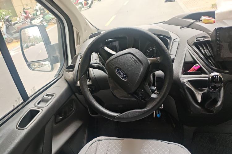 Used Ford Transit 2020 2.0T Diesel Multi-Function Commercial Vehicle Mid-Chassis Low-Roof Design with Dual Rear Doors Meeting China VI Emission Standards Steering Wheel