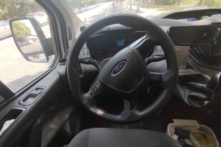 Used Ford Transit 2020 2.0T Diesel Multi-Function Commercial Vehicle Mid-Chassis Low-Roof Design with Dual Rear Doors Meeting China VI Emission Standards Steering Wheel