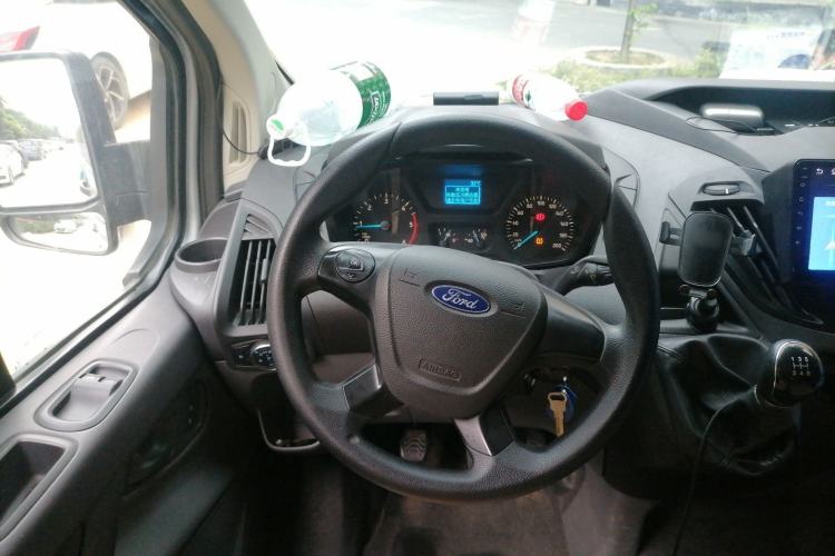 Used Ford Transit 2020 2.0T Diesel Multi-Function Commercial Vehicle Mid-Chassis Low-Roof Design with Dual Rear Doors Meeting China VI Emission Standards Steering Wheel