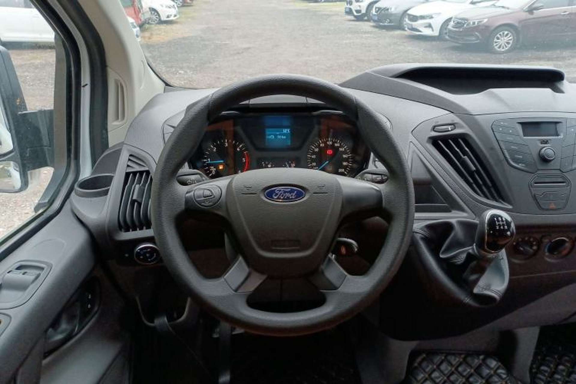 Used Ford Transit 2020 2.0T Diesel Multi-Function Commercial Vehicle Mid-Chassis Low-Roof Design with Dual Rear Doors Meeting China VI Emission Standards Steering Wheel