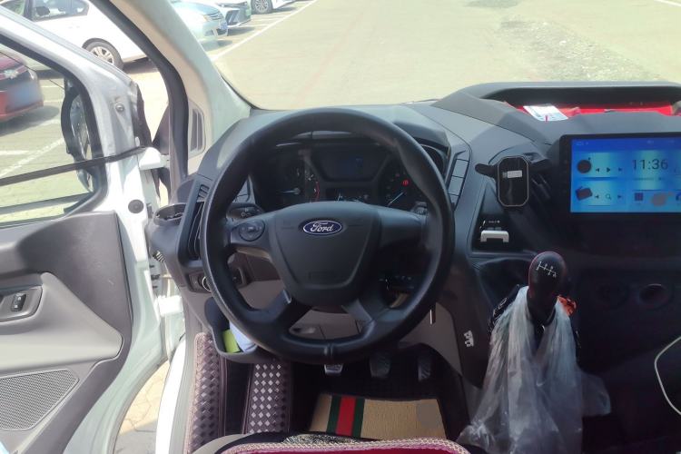 Used Ford Transit 2020 2.0T Diesel Multi-Function Commercial Vehicle Mid-Chassis Low-Roof Design with Dual Rear Doors Meeting China VI Emission Standards Steering Wheel