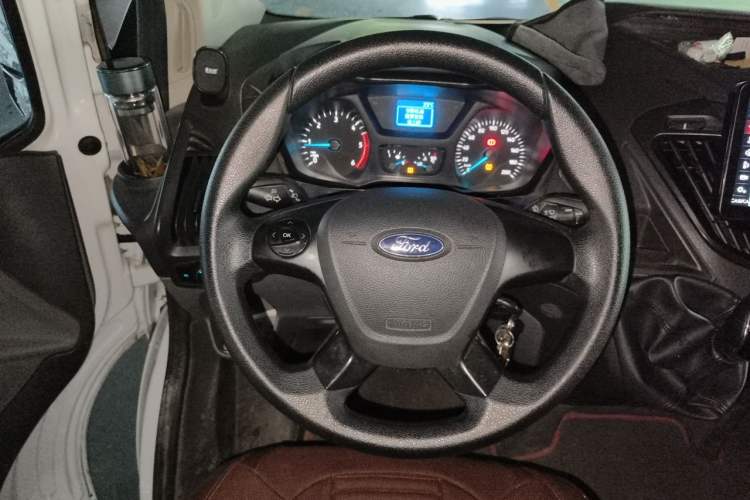 Used Ford Transit 2020 2.0T Diesel Multi-Function Commercial Vehicle Mid-Chassis Low-Roof Design with Dual Rear Doors Meeting China VI Emission Standards Steering Wheel