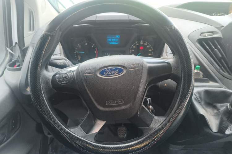 Used Ford Transit 2020 2.0T Diesel Multi-Function Commercial Vehicle Mid-Chassis Low-Roof Design with Dual Rear Doors Meeting China VI Emission Standards Steering Wheel