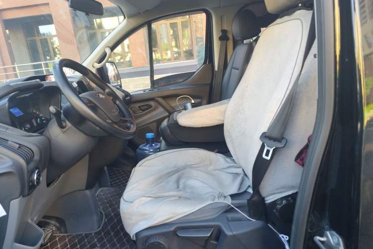 Used Ford Transit 2022 2.0T Gasoline Automatic Multi-Function Commercial Vehicle Mid-axle Low-Roof Design with Dual Rear Doors Meeting China VI Emission Standards Left Front Seat